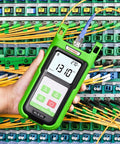 Hand holding Fiber Optic Light Source 1310 1490 1550 Nanometer For PON FTTH Network Testing with SC adapter in use