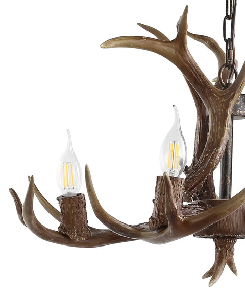 Close-up of 26 Inch Brown Resin Faux Horn Antler Chandelier 4 Light Rustic Farmhouse Hanging Light for Dining Room Living Room Cabin Sloped Ceiling Compatible LED Bulbs Included with LED bulbs in focus.