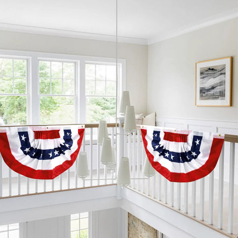 Patriotic Outdoor Pleated Fan Flags 1.5x3 Feet Stars And Stripes Banner 4 Pack displayed on a bright porch railing indoors