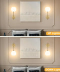 Gold Wireless Wall Sconces Set Of Two With Rechargeable Battery And Remote Features Three Tunable Color Temperatures Plus Twelve Rgb Modes For Chill Bedroom Or Hallway Ambience No Drills Needed And Super Fast Setup, displaying up and down lighting options.