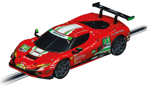 Red Ferrari model car from Ferrari Power Racing Slot Car Track Set With Electric Power, 2 Hand Controllers And 2 Cars, 1:43 Scale.