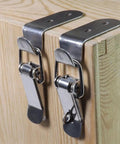 Close-up of Six Pack Heavy Duty 90 Degree Hook Lock Bolts with Spring Toggle on wooden box corner