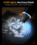 Daily Driver Portable Cordless Engraving Pen Handheld 5 In 1 Rotary Tool engraving detail on black stone with LED lights.