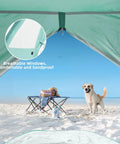 Ultra Spacious Beach Tent For 3 To 4 People With Easy Setup, UPF 50 Plus UV Protection, mesh windows shown on beach