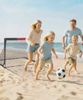 Family playing soccer on the beach with Two 4x3 Ft Portable Pop Up Soccer Goals Backyard Training Set With Ball Pump Cones Ground Nails And Carry Bag