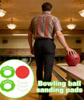 Straight Up Top Tier Bowling Ball Sanding Pad Holder Two Pack Ergonomic Polymer Stand, shown with green sanding pads and bowling ball.