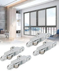 Heavy Duty Stainless Steel Double Wheel Roller Pulleys 4 Pack Dead Silent Glide Track Wheels For Sliding Closet Doors And Cabinet Windows Easy Swap Smooth Ride displayed in a modern living room setting.