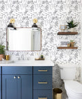 Gray Floral Peel And Stick Wallpaper 17.7 Inch By 118.1 Inch Self Adhesive Floral Contact Paper Waterproof Removable Wall Covering For Bedroom Bathroom Cabinets Decor No Residue in a bathroom with blue vanity.