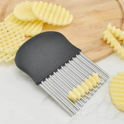 Crinkle cutter with black handle and multiple stainless steel blades for crinkle-cut fries.