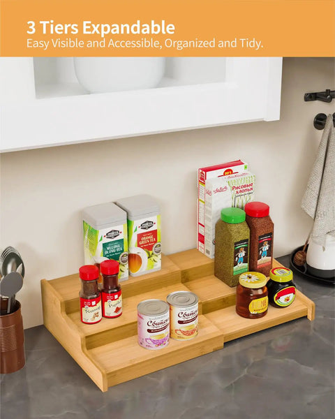 Premium Grade Three Tier Natural Bamboo Spice Rack With Adjustable Cabinet Organizer Shelf For No Sweat Kitchen Countertop Storage And Slick Rust Proof Home Setup with spices and jars.