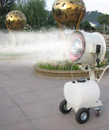 Beat The Heat 20 Inch Portable Misting Fan With Dust Removal For Patios Parks Carnivals And Large Spots features smooth roll cart misting in outdoor setting.