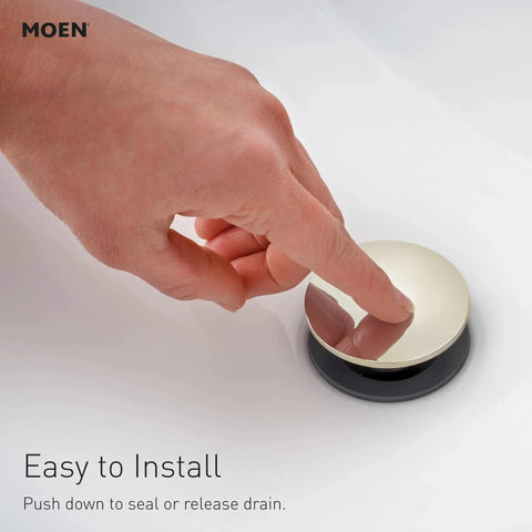 Person pressing the drain of Meena Chrome One-Handle Bathroom Sink Faucet With Single Hole Mount And Optional Deckplate Drain Assembly.