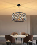17.8 Inch Crystal Chandelier Pendant Light With Large Round Black Metal Frame And Crystal Ball Orbs over a dining table