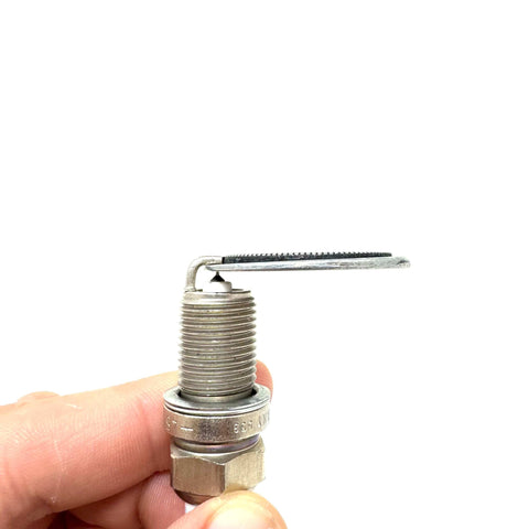 Hand holding Coin-Style Spark Plug Gap Tool For Quick Checks, 0.020-0.100 In Gap Range, Plated Steel Build shown in use