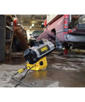 Rock Solid 150000 BTU Propane Forced Air Job Site Heater featuring rugged steel frame and quiet burner in workshop setting.