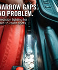 Compact 3 Mode LED Flashlight With Clip for EDC illuminating narrow car gap, showing precision lighting for inspections.