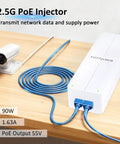 Get Your Network Ready With This 90W PoE Plus Injector connecting to a camera and blue cable on a wooden table.