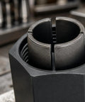 Close-up of a Badass Socket Wrench Assembly Collet Set With Matched Hex Nut Pairs, slotted steel design for secure grip.