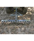 Landscape Rake Attachment For ATV Or UTV, 60 inch wide with 17 tines, heavy-duty yard leveler shown mounted on ATV