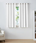 Room Darkening Blackout Curtain Panels With Grommets Set Of 2 White 52 By 63 Inches for Privacy Hanging in Living Room.