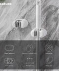 Three Pack Wall Mount Mop And Broom Holder Organizer With Self Adhesive Clips For Bathroom Kitchen Garage Garden Made Of ABS Plastic Sturdy Non Slip Hanger Rack mounted on a marble wall with icons showcasing features.