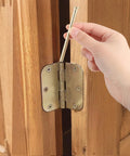 Installing Four Pack Three Point Five Inch Interior Door Hinge Pins Stainless Steel Self Closing Security Pins in wooden door.