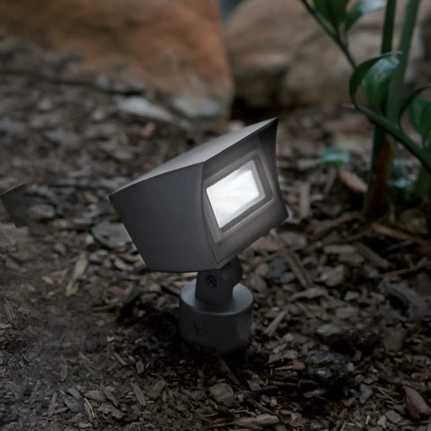 Wall Wash LED Landscape Light 12V With Built In Dimming 3000K Warm White Solid Brass Bronze Coated Housing in garden setting