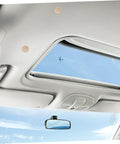 Beige Car Roof Headliner Repair Kit With Easy Install Snap Rivets Interior Ceiling Fix That Blends Perfectly Sagging Headliner Repair Made Simple Seamless Look For Your Ride installed view from inside car with sky view through sunroof.