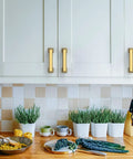Kitchen scene featuring 20 Pack 7.5 Inch Matte Black Cabinet Handles Cabinet Pulls For Kitchen Cupboards And Drawers Built To Last Heavy Duty Hardware Rustproof Finish Easy Install Non Toxic Sleek Modern Style on white cabinets.