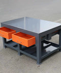 Heavy Duty All Steel Workbench With Two Lockable Drawers And Open Shelves, grey and orange design, ideal for garage tasks.