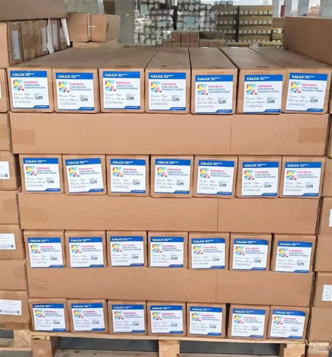 Stack of Sticky High Tack Sublimation Transfer Paper Roll 36 Inch By 328 Feet For Elastic Fabrics Polyester Spandex in boxes.