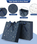 Four Pack 9 Inch Gift Bags In Premium Blue With Tissue Paper Medium Size 7x4x9 Inches, star pattern, smooth ribbon