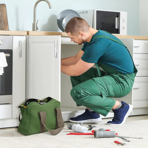 Handyman with green Canvas Tool Bag For Handyman Pros 12 Inch Small Tote With Large Capacity on kitchen floor