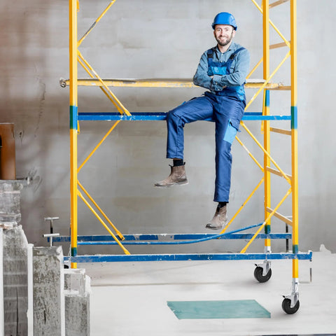 Man sitting on scaffolding with 5 Inch Scaffolding Casters Set of 2 With Dual Locking Brakes, heavy duty build visible.