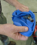Hands using Blue Industrial Cloth Rags for Auto Mechanics and Janitorial Work, Heavy Duty, Low Lint, Durable and Reusable, 16 By 24 Inch, Cotton Blend
