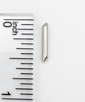 Heavy Duty 14 Gauge 1/2 Inch Heat Tolerant to Cone 5 Stilt Pins Kiln Safe For Ceramics And Pottery 250 Pack Pro Grade Pre Cut For Easy Placement In Kilns And Firing For Home Studio Use, close-up beside ruler