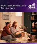 Couple enjoying comfortable light while relaxing at home, reading magazine with stylish decor and soft lighting.