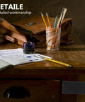 2 Pack Stainless Steel Flat Straight Braces Brackets on wooden desk next to pencils and notebook