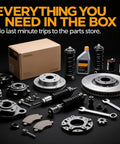 Automotive spare parts including brake pads, rotors, and shock absorbers, arranged with a cardboard box and tools.