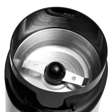 Interior view of Fast Electric Coffee Grinder For Home Use Easy To Use Coffee Bean And Spice Grinder with heavy duty stainless steel blades.