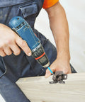 Heavy Duty 20 Piece Cabinet Door Latch And Catch Kit In Rich Brown Antique Copper Finish Solid Galvanized Steel being installed with a drill.