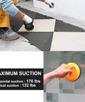 Person using Heavy Duty Glass Vacuum Lifter With 5 Inch Suction Cup Power Grip For Glass Tiles Mirrors Granite; maximum suction shown in use