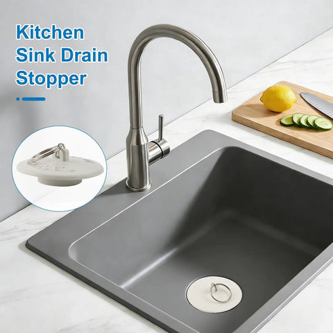 Six Size Universal Drain Stopper Set With Pull Ring Rubber Sink Plugs For Kitchen Bath Laundry And Tub That Easily Fits Seven Eighths Inch To Two Inches Across Six Sizes White in a kitchen sink.