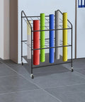 Heavy Duty Three Tier Mobile Paper Rolls Organizer With Slick Metal Frame And Twenty Roomy Slots displaying colorful paper tubes.
