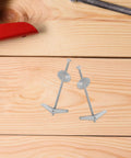 Heavy Duty Toggle Bolts And Wing Nut Kit For Drywall And Wood Panels Wall Anchors For Hollow Walls And Cement on wooden surface