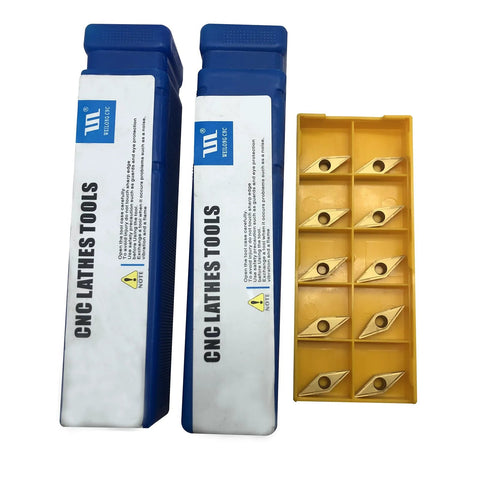 Two blue 1/2-inch indexable lathe turning tool holders with VCMT carbide inserts; yellow insert tray.