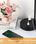 Industrial Black USB Table Lamp With Bulb Included on desk, USB ports visible, modern farmhouse style, metal base, floral decor nearby.