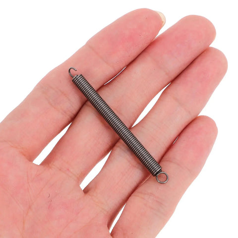 Dope 20 Piece Stainless Steel Extension Springs 0.6x4x60mm With Hook Ends For Home Repair Crafts And Mechanical Projects Tension Spring Kit That Gets The Job Done Easy, single spring in hand