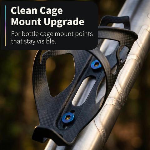 Clean Cage Mount Upgrade for bottle cage points, featuring a carbon fiber holder with blue screws on a silver bike frame.