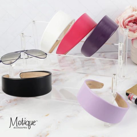 Slay Your Daily Hair Game With This Super Comfy Two Inch White Vegan Leather Headband For Women featuring various colors displayed.
